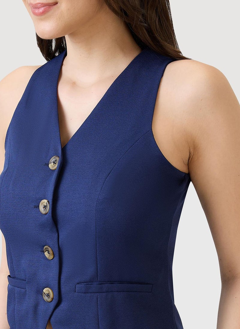 جلو باص طقم نسائي بلون كحلي من جلوبس، سترة بياقة على شكل حرف  وجيوب أمامية مع بنطلون، طقم عمل - Image 5